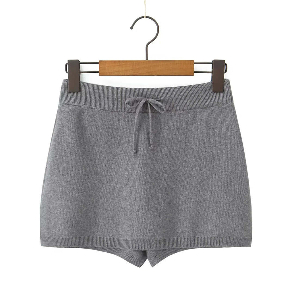 Falda gris de punto con botones